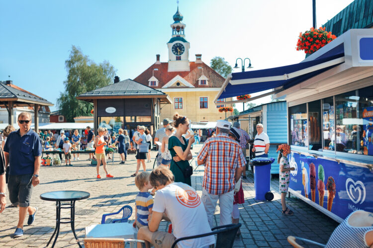 People at summer in Rauma Market Place.