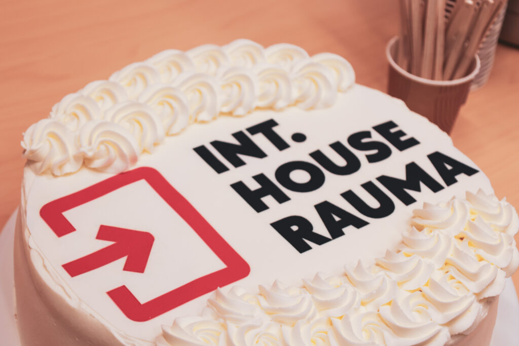 Cake with text Int. House Rauma on the top.